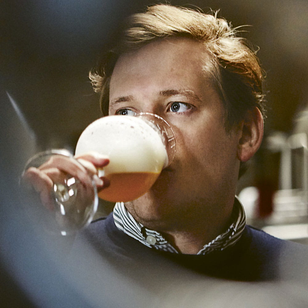 man drinking beer