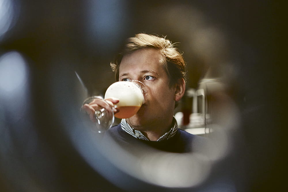 man drinking beer