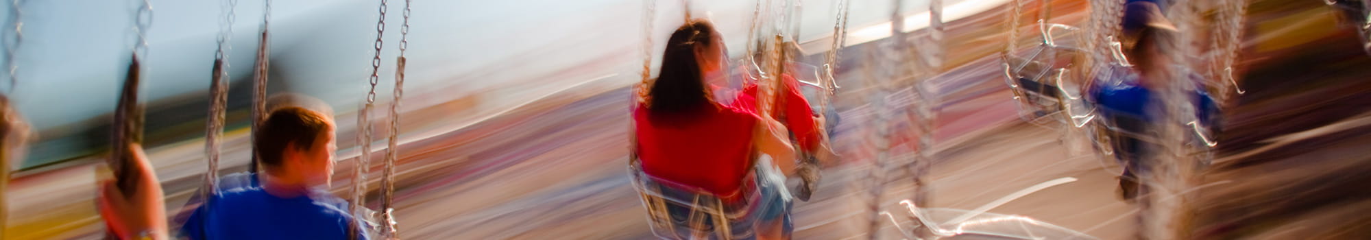 A few people on the chain carousel