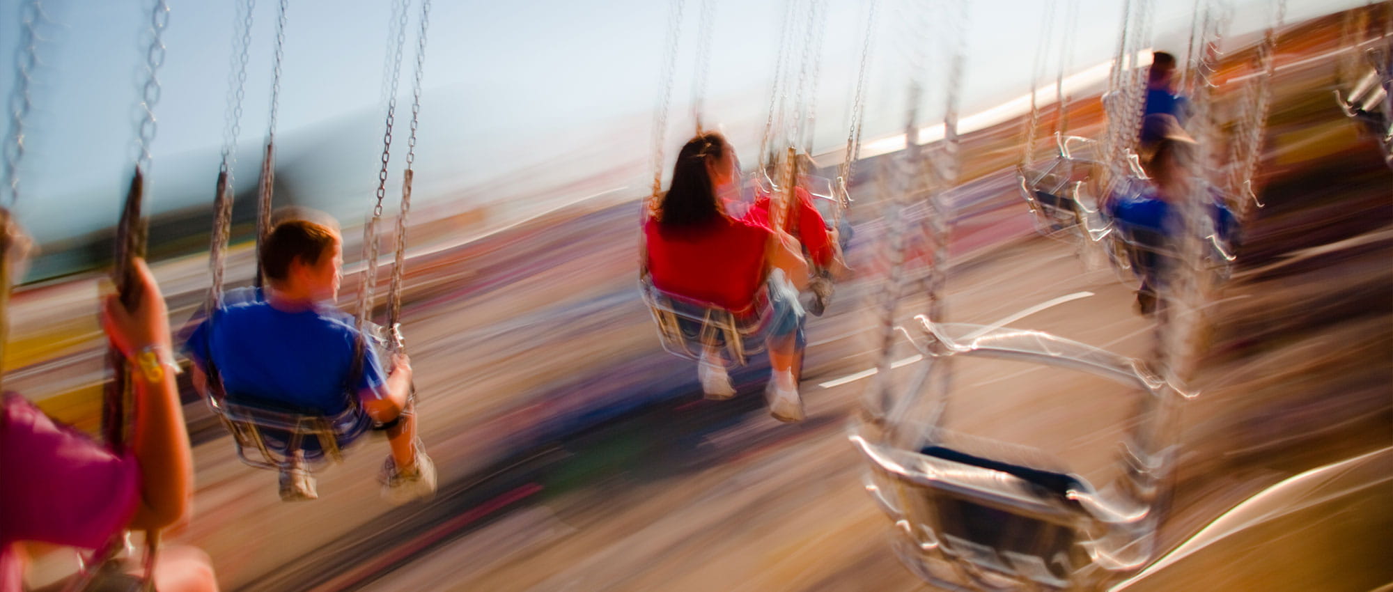 A few people on the chain carousel