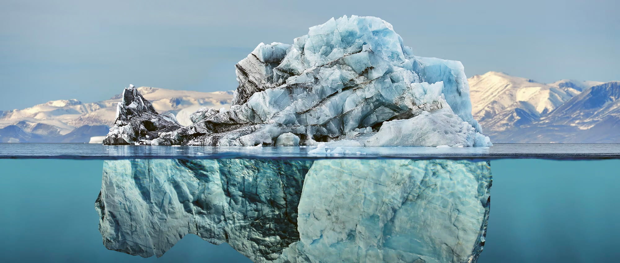 Image of an iceberg above and below sea level. Copyright: posteriori/ istockphoto.com