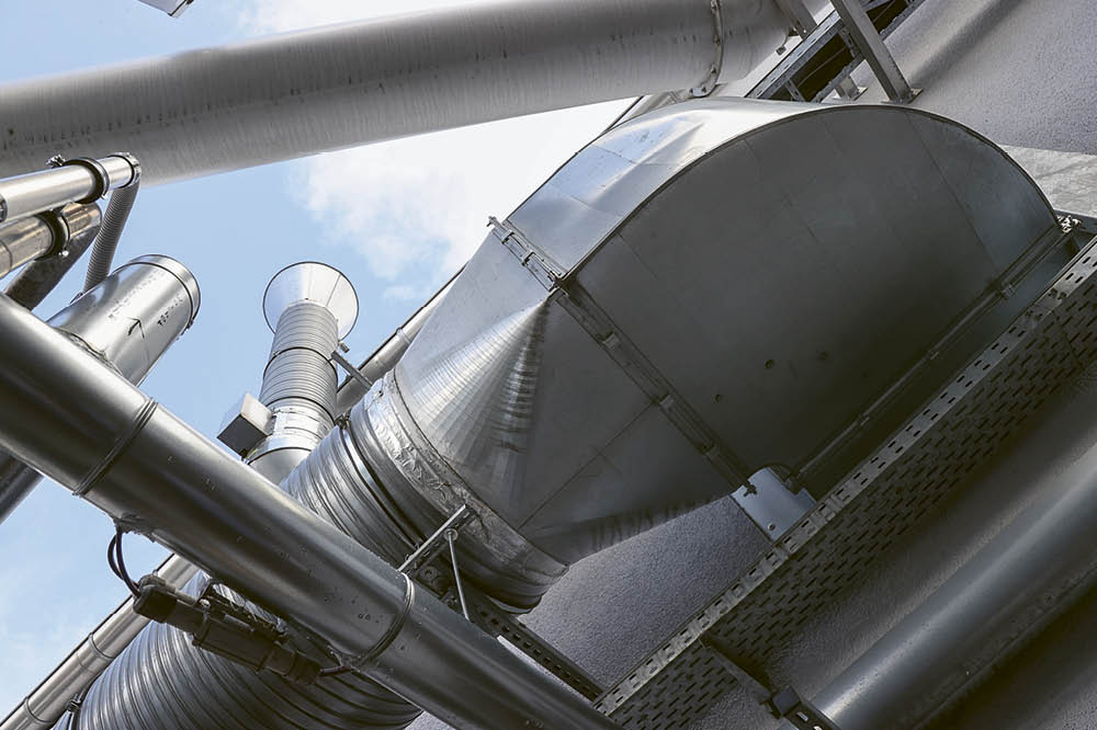 Biological exhaust air treatment pipe outside of the factory. 