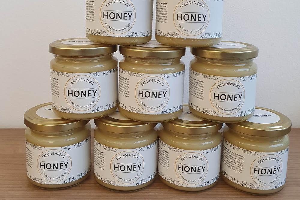 Freudenberg Honey stacked in a pyramid.