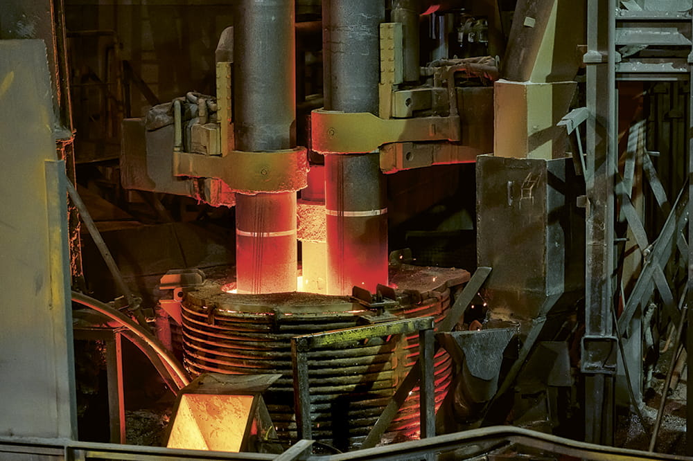 Scrap steel is processed electronically.