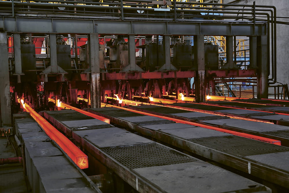 Hot steel flows through molds. Copyright: iStock: Frankhuang