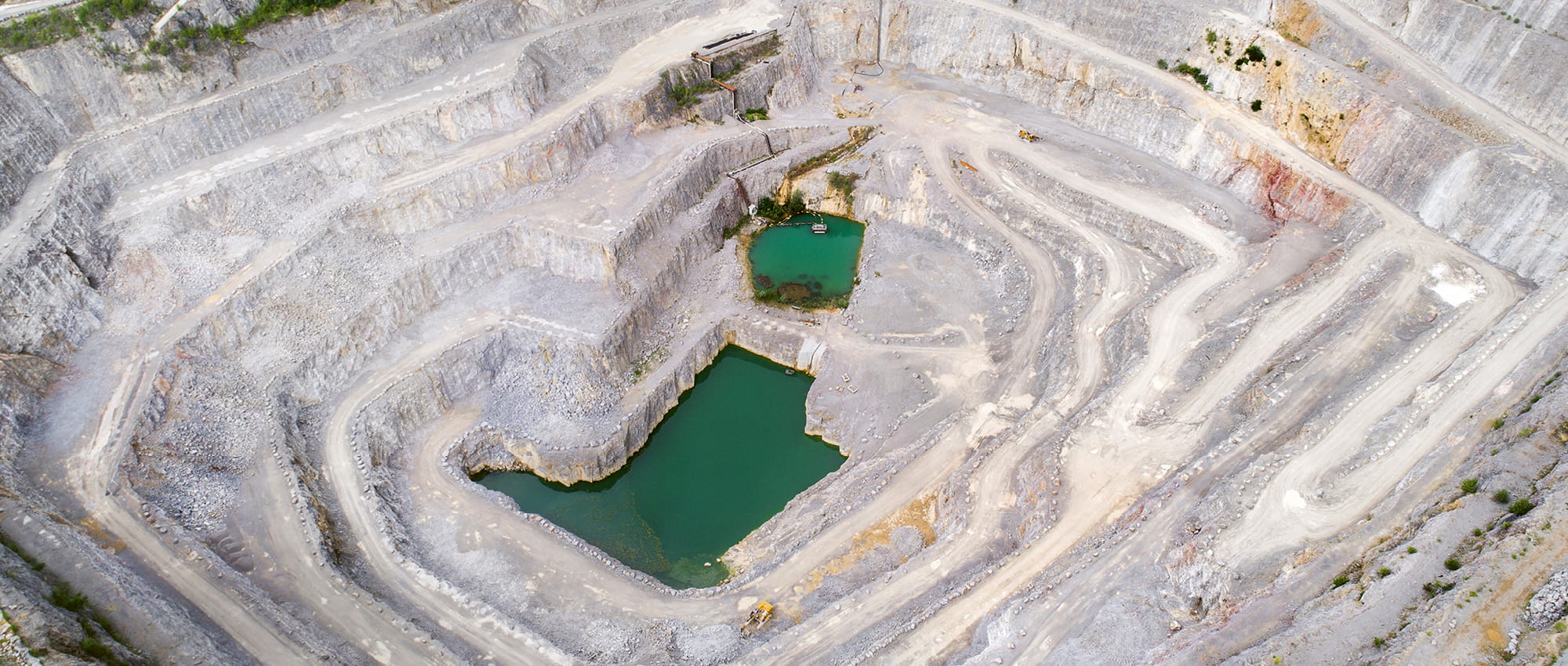 Bird-eyes view of a surface mine. Copyright: iStock: ollo.