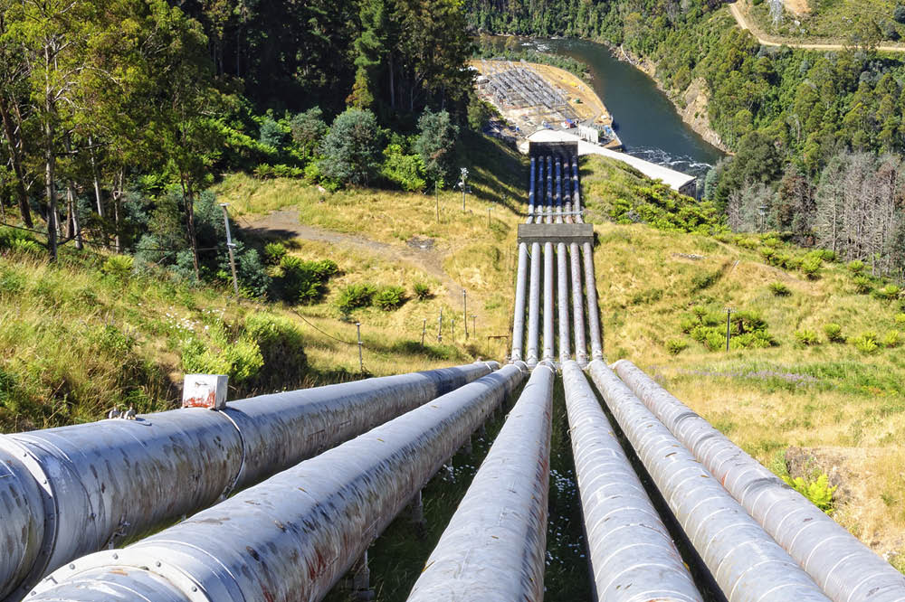 Pipes of a pumped storage power plant lead down a mountain. 