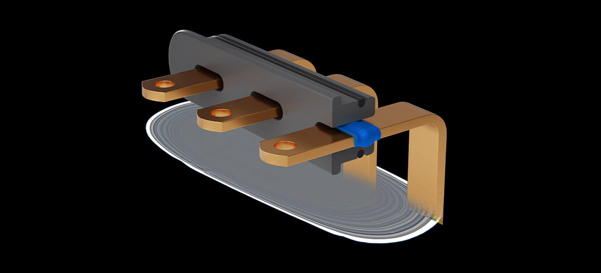 Three copper busbars in a thermoplastic component, shown in cross-section with a blue elastomer layer.