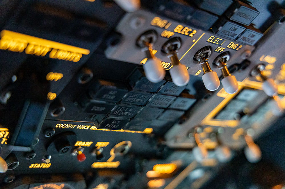 Aircraft cockpit control panel emphasizing the critical role of engine seals in safety and performance under extreme conditions.