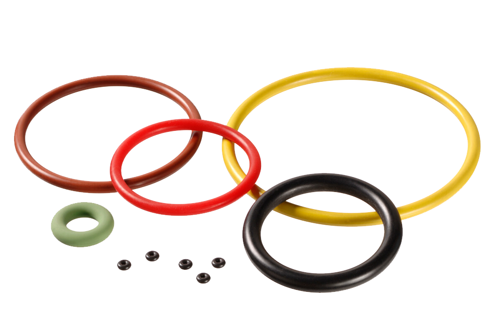 A variety of colorful large and small Simmerrings lie on a white background