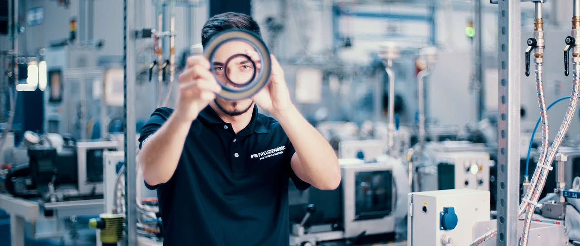 An employee takes a close look at a seal