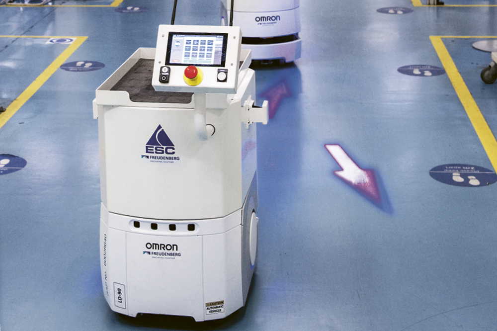 Two AMR robots drive through the North Shields plant