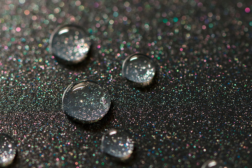 Close-up of a non-stick surface with beading drops 