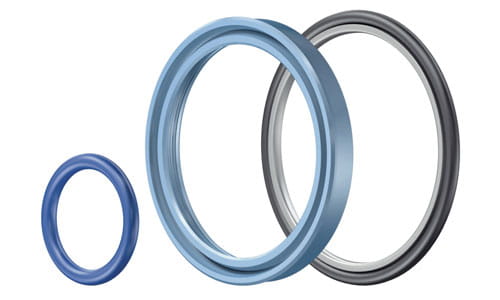 One small blue Merkel Omegat seal ring and one large blue and one large gray Merkel Omegat seal ring against white background